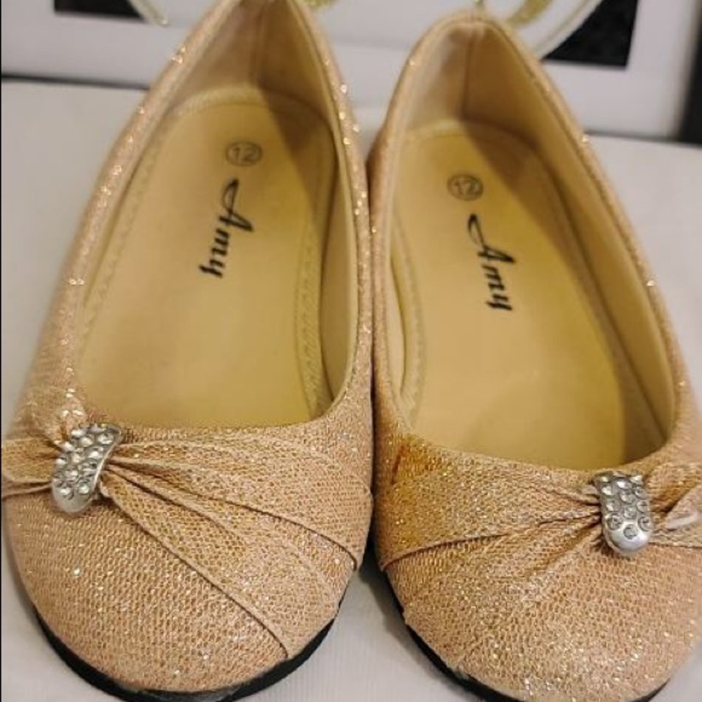 Gold sparkly girls shoes from Zulily with silver